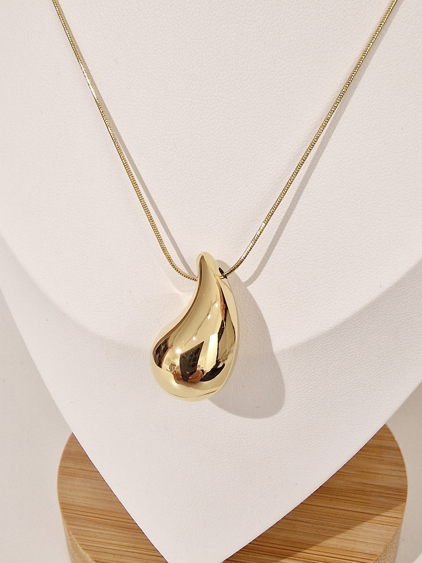 Collier goutte acier or