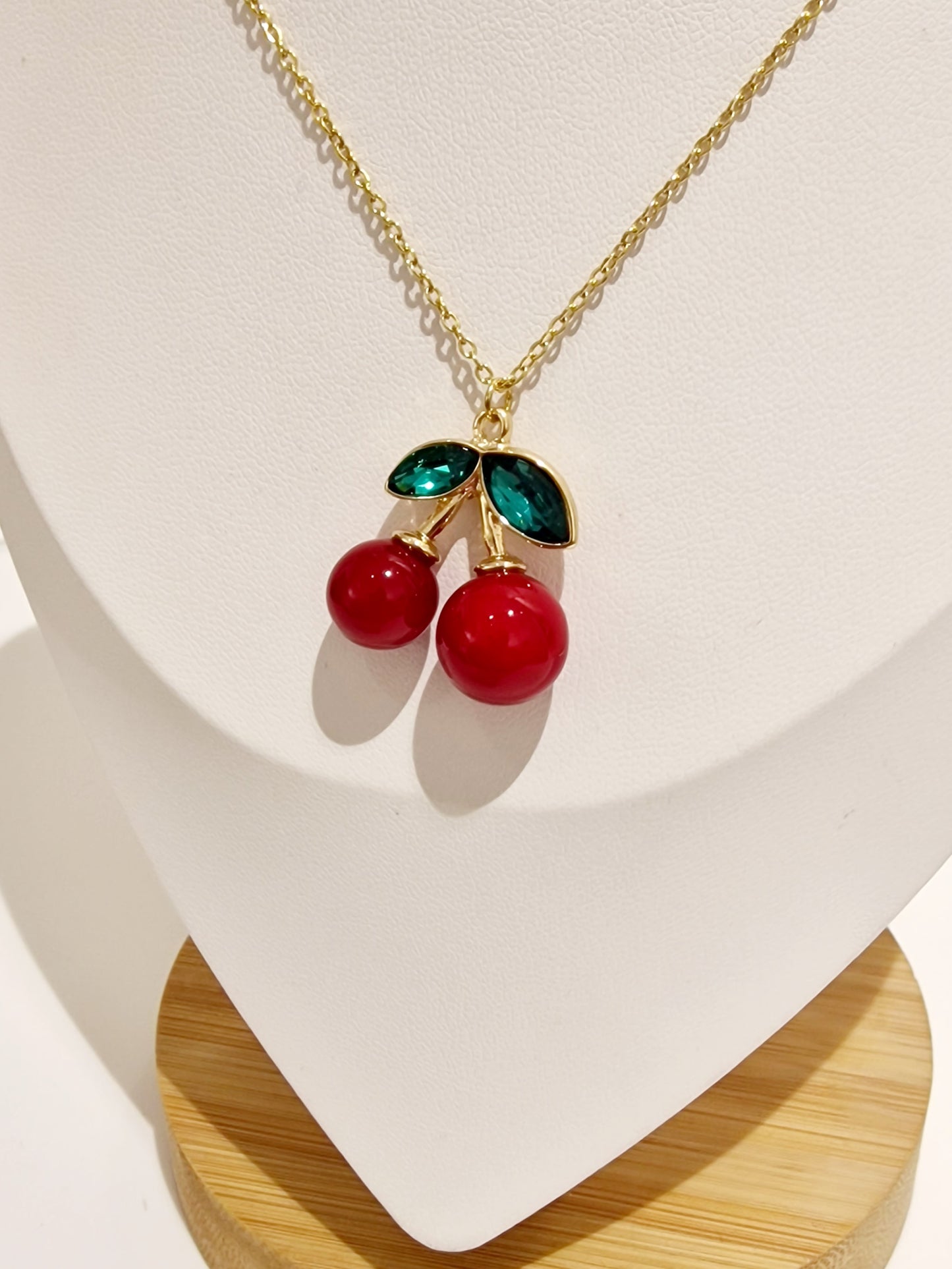 COLLIER CERISE ACIER OR