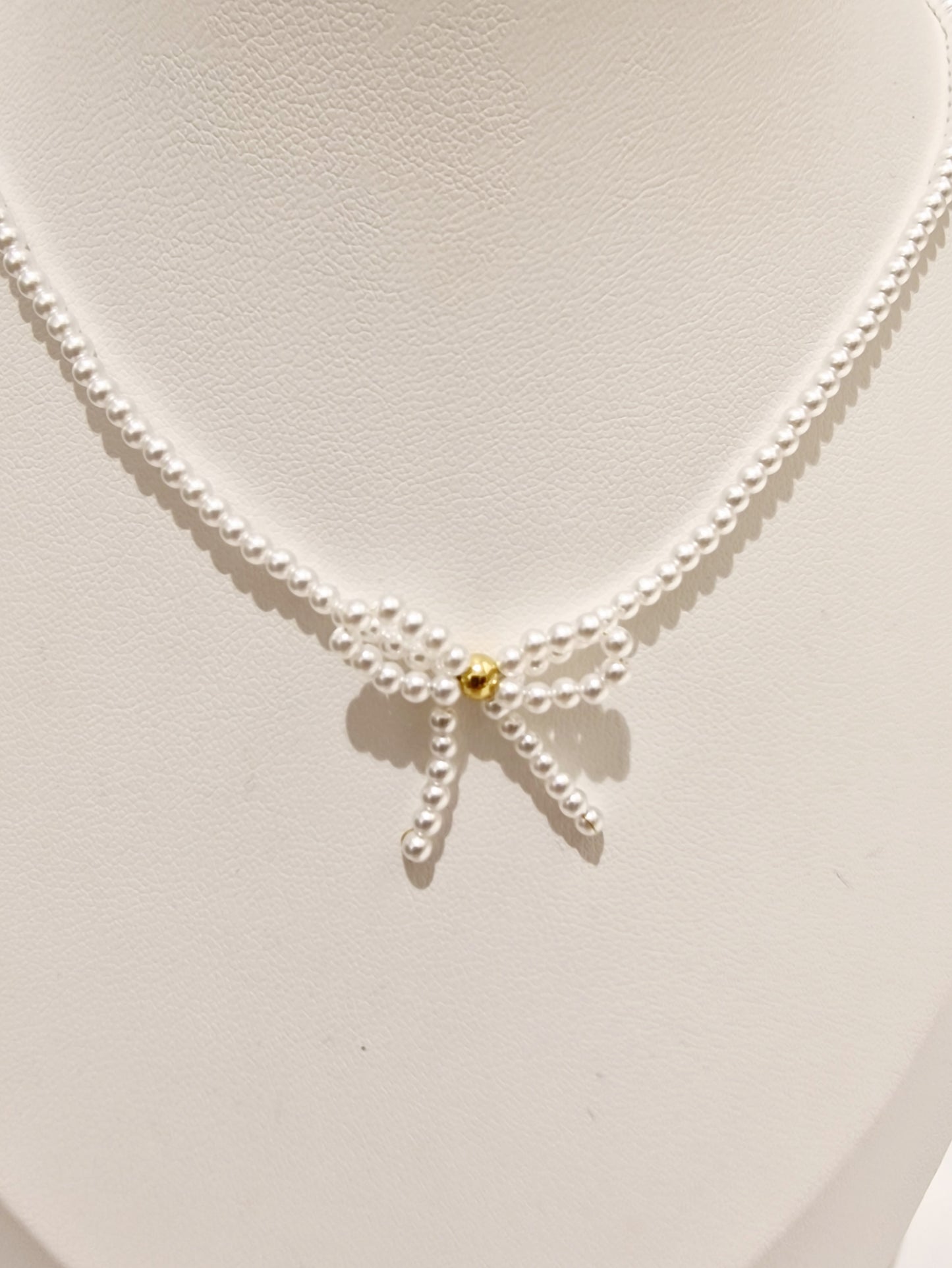 COLLIER AITON ACIER OR